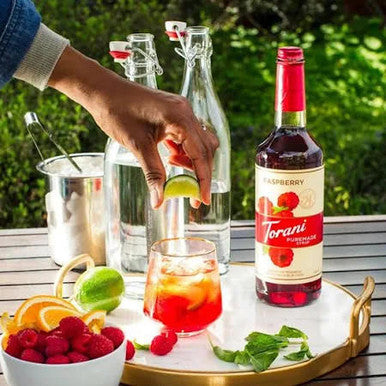 Torani Puremade Raspberry Flavoring Syrup - 750 mL of Tart Berry Bliss (12/Case)
