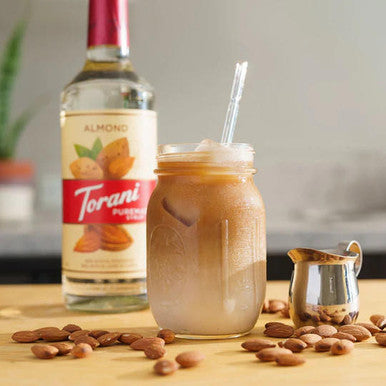 Torani Puremade Rich Almond Flavoring Syrup 750 mL Glass Bottle (12/Case)